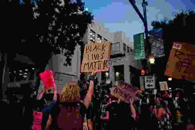 Image Of A Progressive Rally With Signs Advocating For Social Justice, Economic Equality, And Environmental Protection Ungodly Unamerican And Unhinged: The New Radicalized Democratic Party